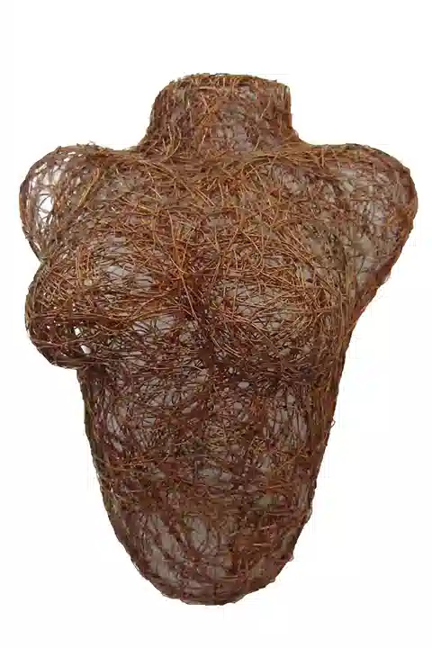 Wall sculpture of a female bust made of copper
