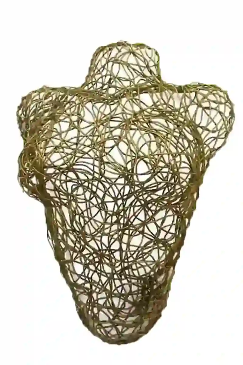 Wall sculpture of a female bust made of brass